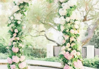 Pink and white rose wedding arch