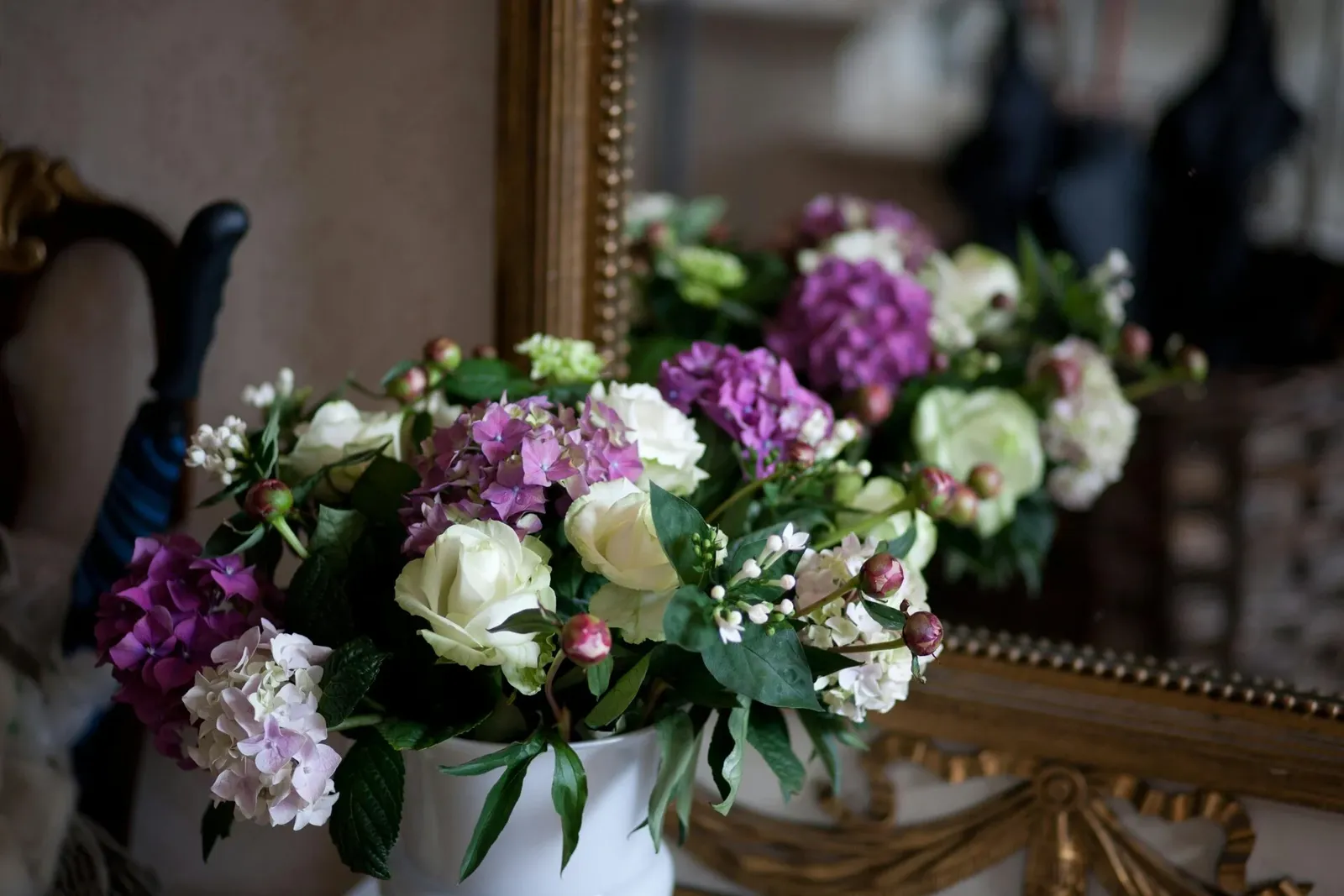 Hydrangea and white rose vase arrangement